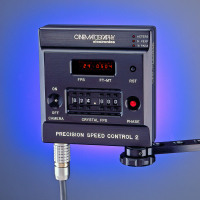 Studio Product Photography on blue background with magenta glow around the equipment 